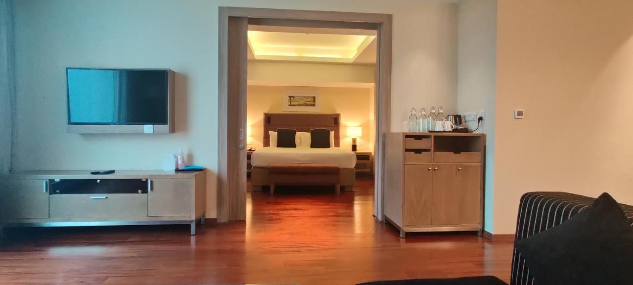 O By Tamara, Trivandrum トリバンドラム エクステリア 写真 A suite at the hotel