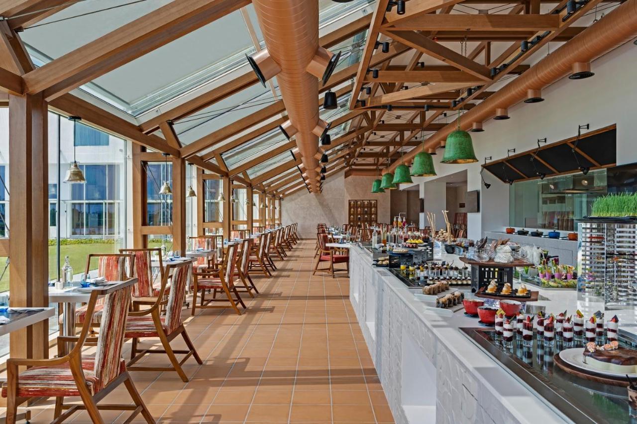 O By Tamara, Trivandrum トリバンドラム エクステリア 写真 The restaurant