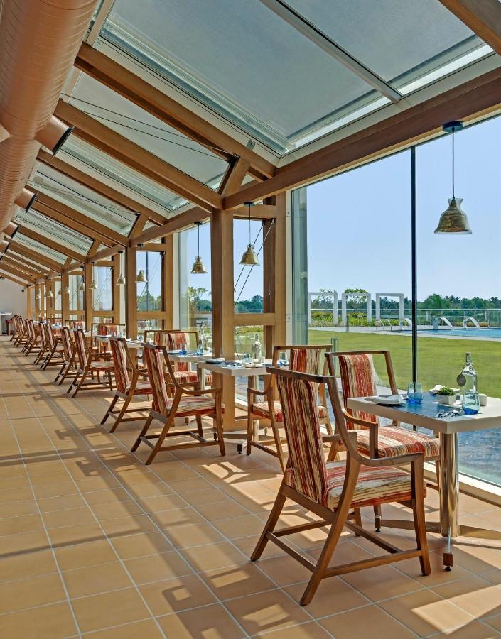 O By Tamara, Trivandrum トリバンドラム エクステリア 写真 Restaurant